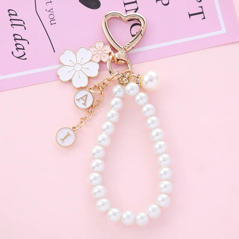 Enamel Flower Imitation Pearl Keychain for Women Fashion Sweet Letter Heart Key Buckle Handbag Earphone Case Decoration Jewelry