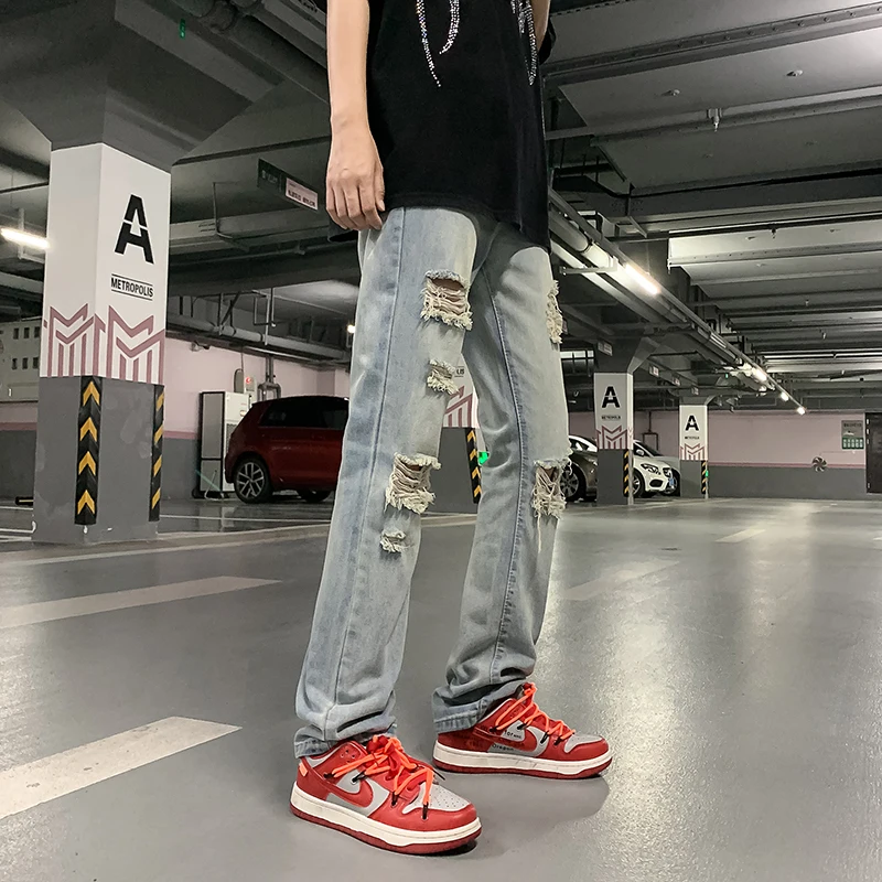 

American retro fashion brand ripped jeans for men in summer, thin and niche design, straight long trousers with rough edges