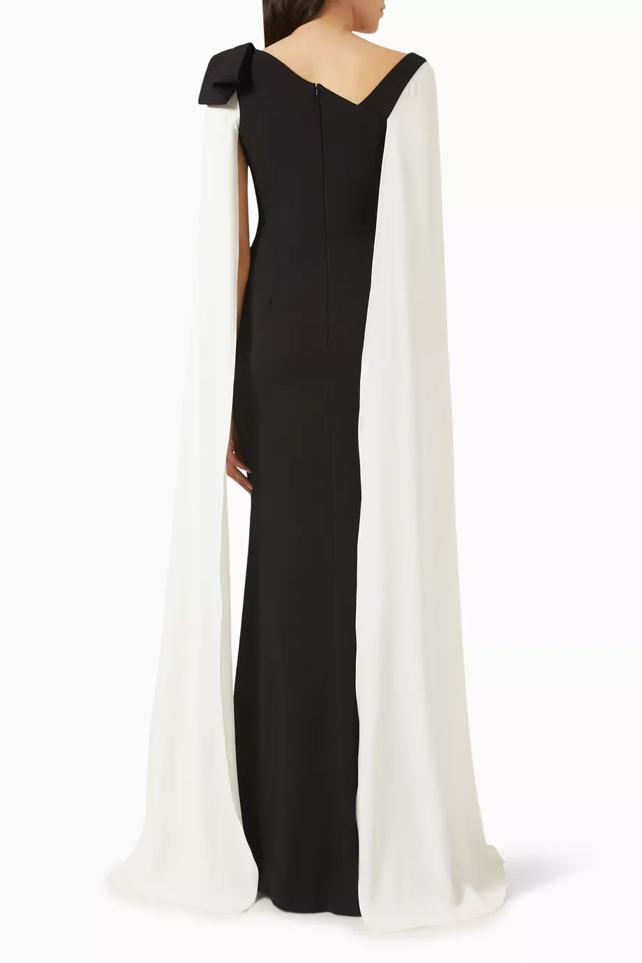 Understated contemporary elegance Inspired tailored kaftan dress artfully drapes and falls beautifully robes de soirée