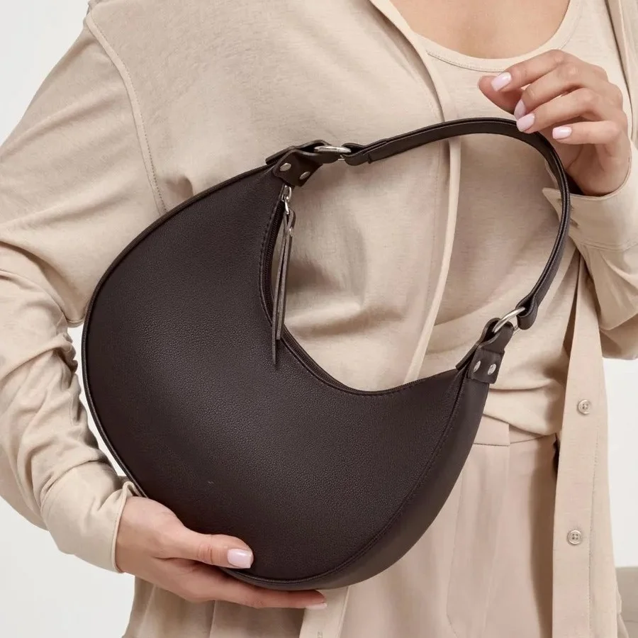 Women's Burgundy Crescent Hobo Bag Smooth Faux Leather Shoulder Bag with Tassel Detail for Daily and Evening Use