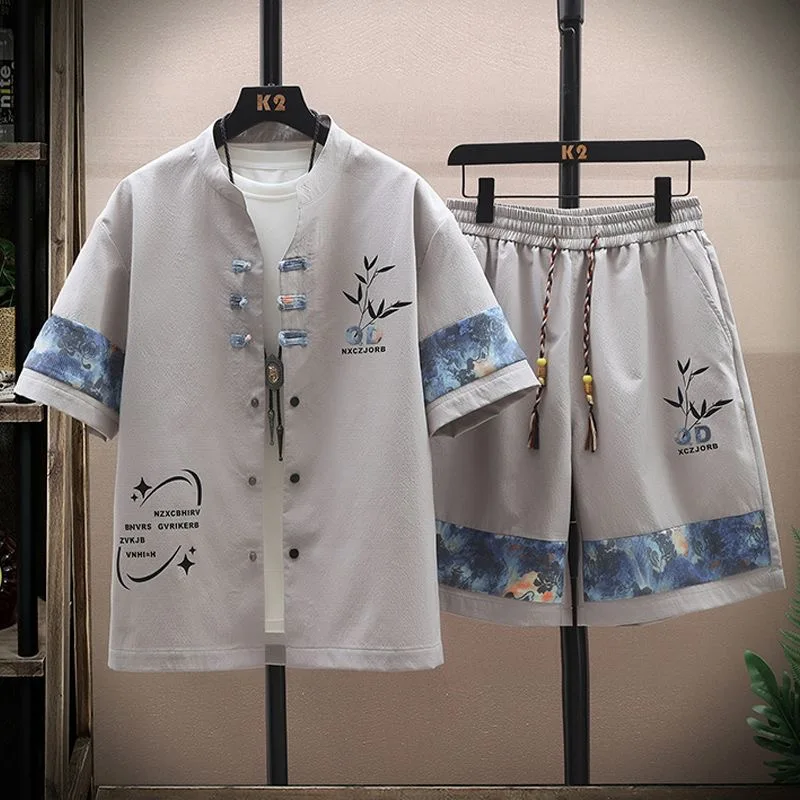 

Летний новый модный комплект из двух предметов: дышащая рубашка с коротким рукавом и принтом для мужчин, повседневный свободный спортивный комплект высокого качества.