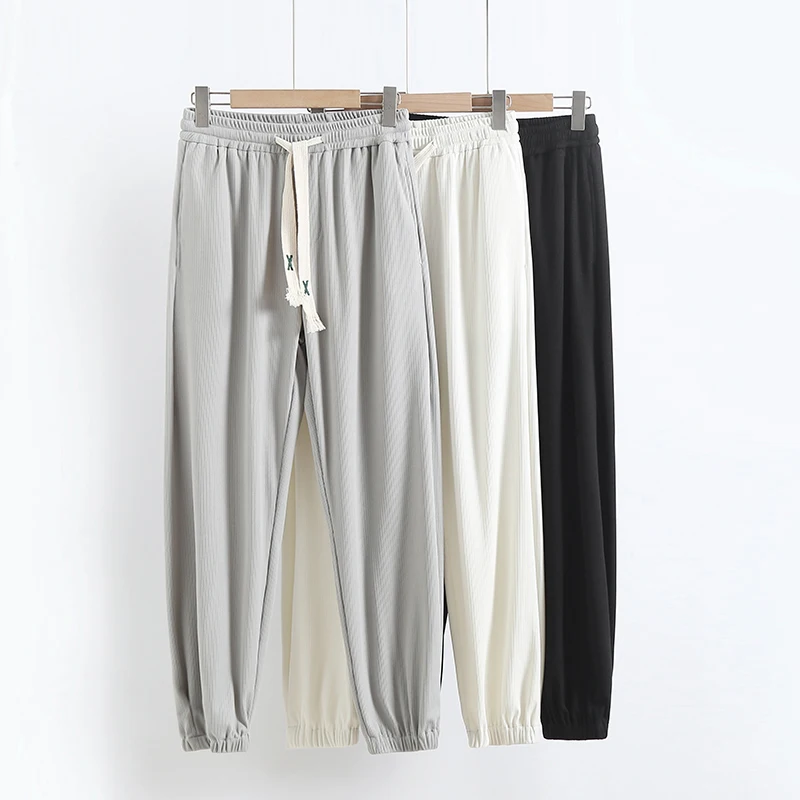 

Новые летние мужские повседневные свободные тонкие шелковые цветные универсальные брюки из девяти предметов спортивные модные брендовые брюки Харлан