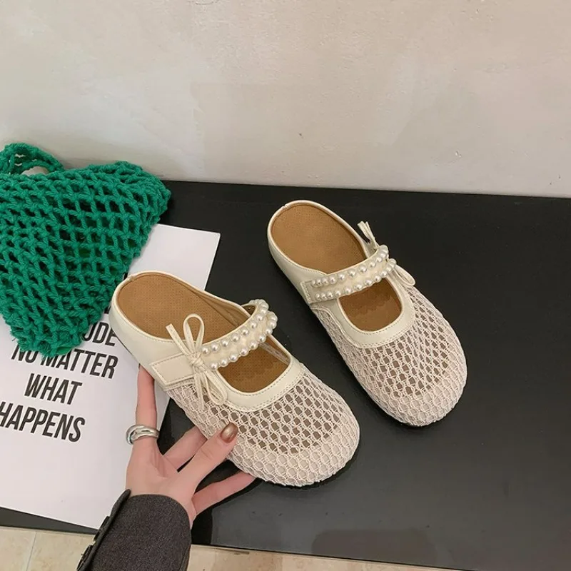 

Женские летние сандалии 2026 года на плоской подошве, сетчатые, в балетном стиле, с круглым носком, на резиновой подошве, с металлическим декором, в корейском стиле, однотонные