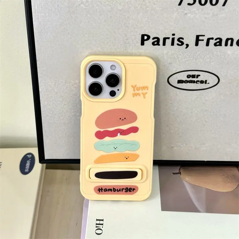 

Cute cartoon burger stand phone case suitable for iPhone 16 anti drop iPhone 15 fashionable iPhone 14 creative