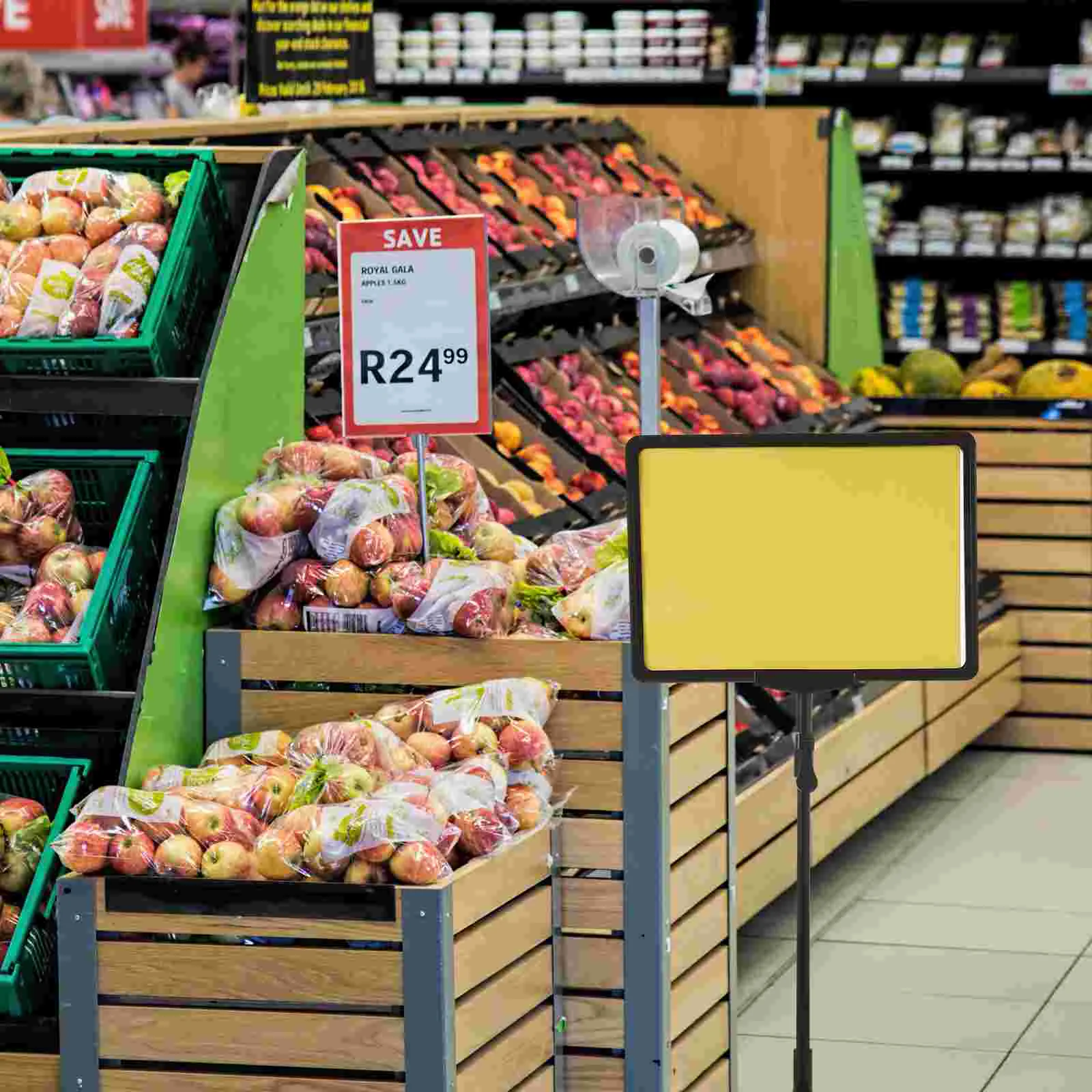 L'etichetta dei segni promozionali di pubblicità del cartellino del prezzo del supermercato fornisce il supporto rotante del supporto del bordo di plastica