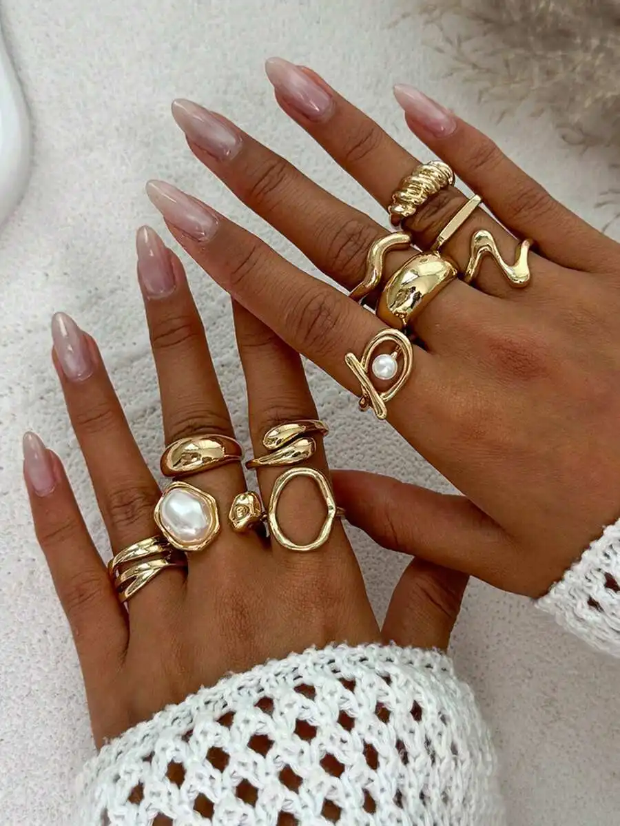 

8-Piece Gold-Tone Bohemian Stackable Rings Featuring Pearl, Organic Loops, And Textured Abstract Forms For Women
