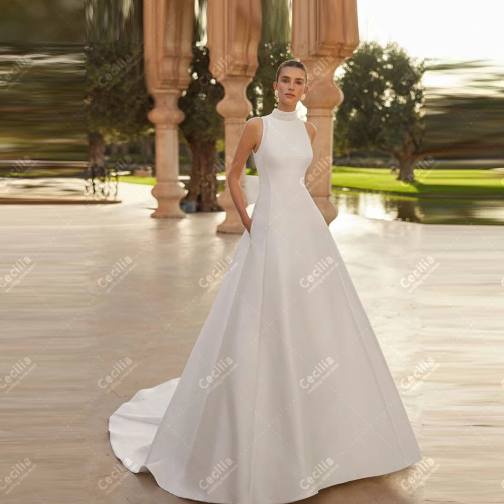 Abiti da sposa affascinanti Una linea di abiti da sposa in raso senza maniche Abiti moderni per la festa formale Abiti da sposa personalizzati 2025