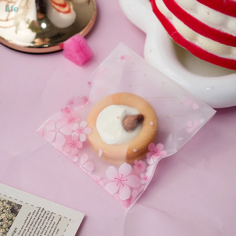 

100pcs Cherry Blossoms Candy Bags Transparent Flower Cookie Baking Packaging Bag For Wedding Birthday Party DIY Gifts Wrapping