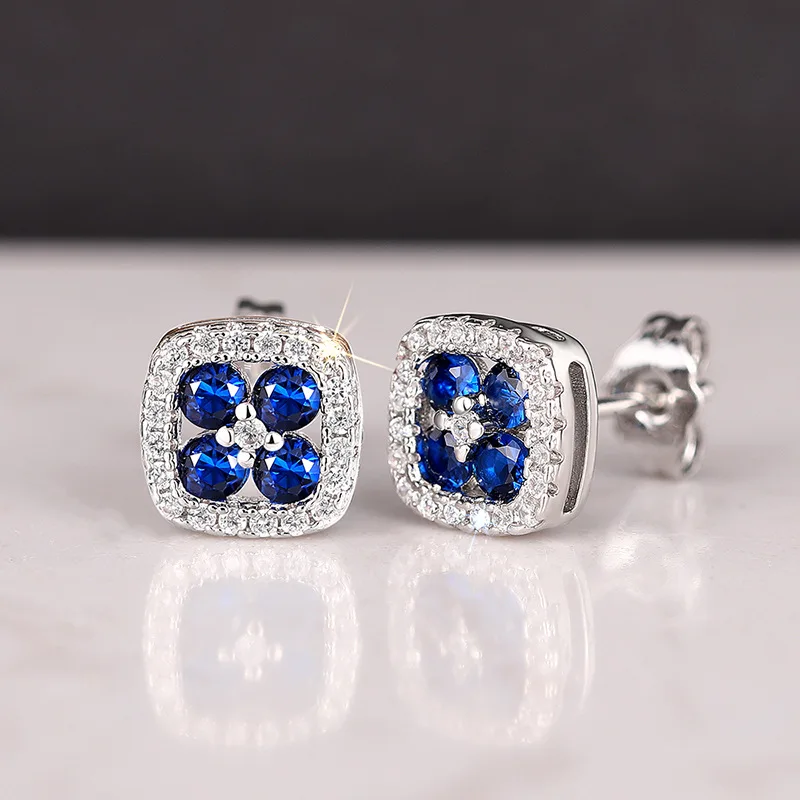 

Elegant Blue Zircon Flower Stud Earrings | Copper - Based | Silver - Tone