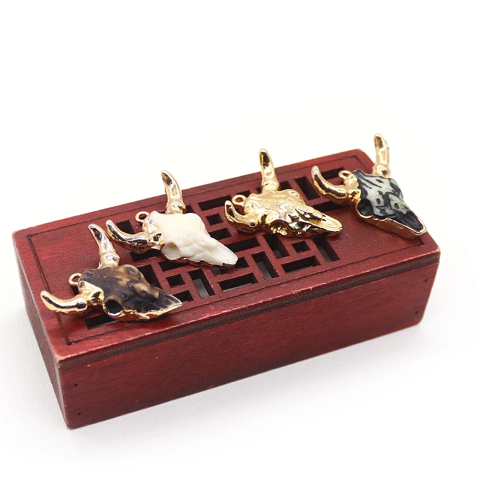 Natural Resin White and Gold-color Bull Skull-Shaped Pendant 27x29mm Wholesale for DIY Necklace Keychain Jewelry Accessories