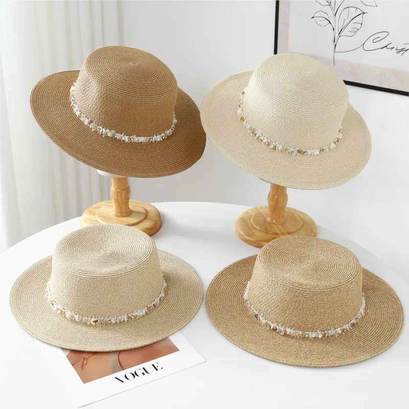 

A decorated hat with flat top and large brim to show off the face small sun-protective for women by seaside
