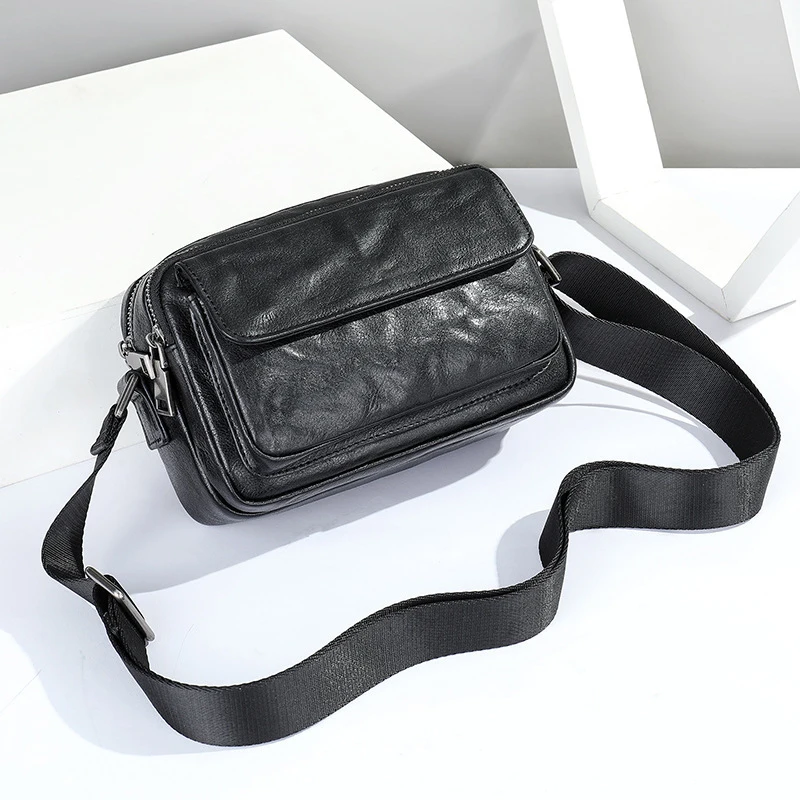 Leather shoulder bag with cowhide texture, crossbody style, casual leather clutch, luxury lightweight handbag