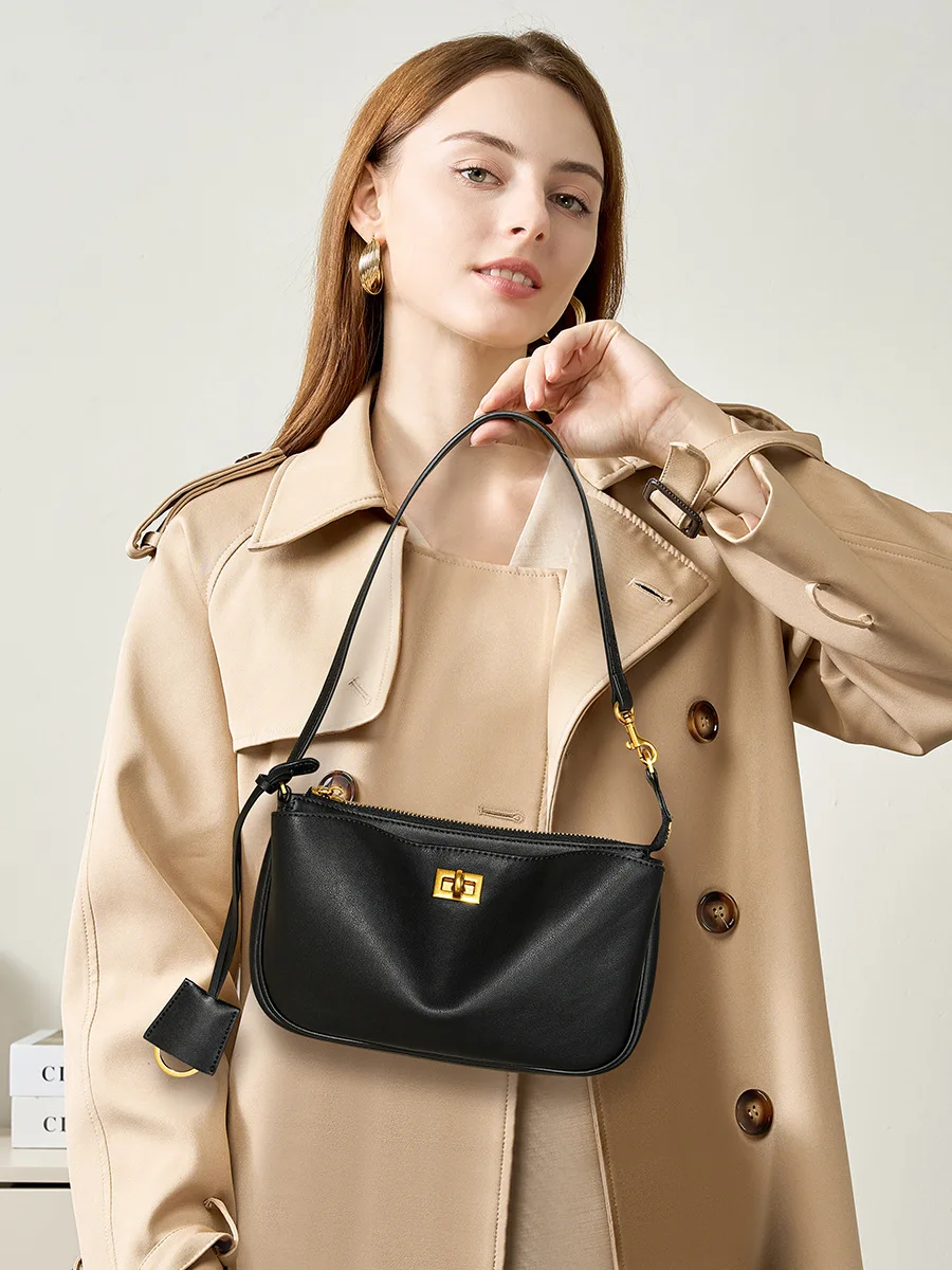 New versatile and niche hand-held magic stick bag with high-end leather buckle rodeo Kelly single shoulder armpit bag