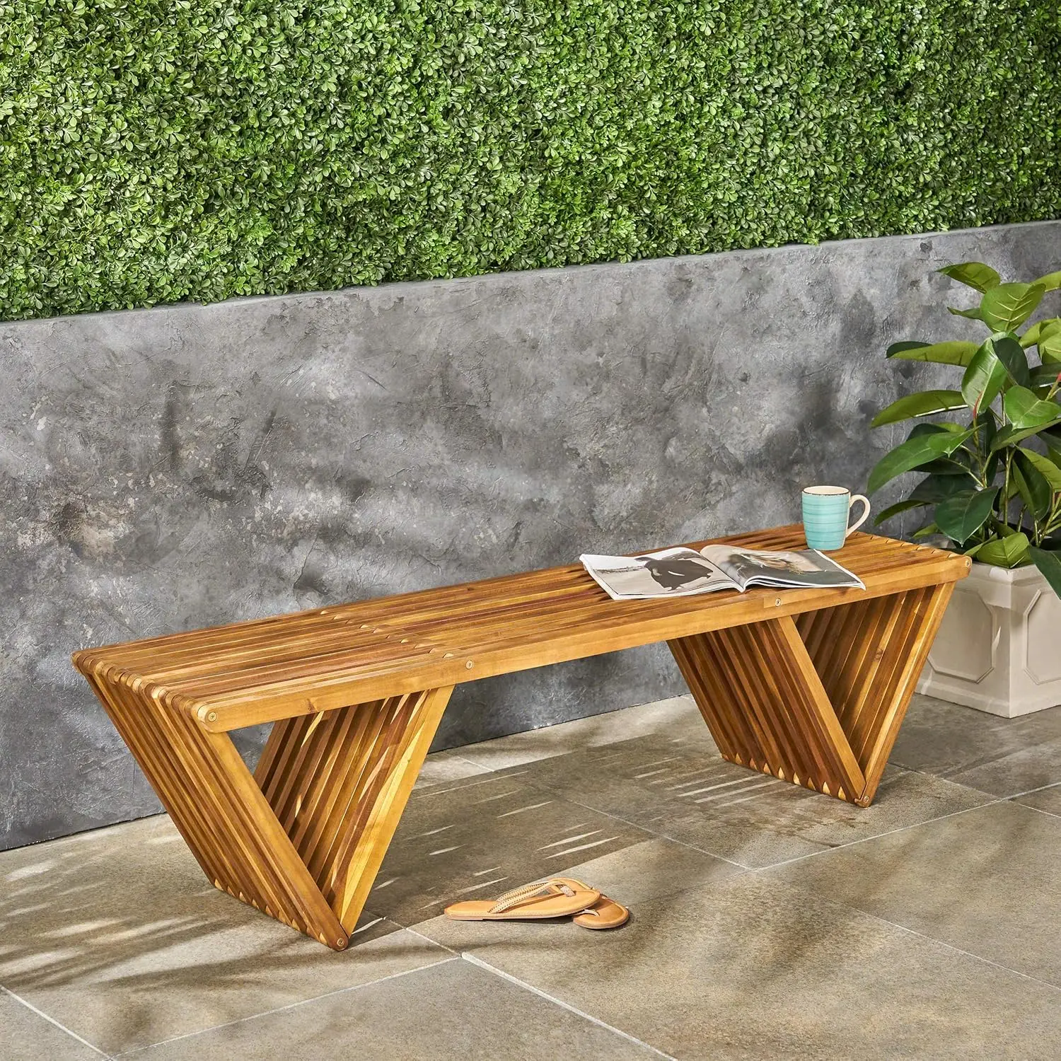 Outdoor Acacia Wood Bench Teak Finish Hand Crafted Details sure to impress Features a pleasing good conversation