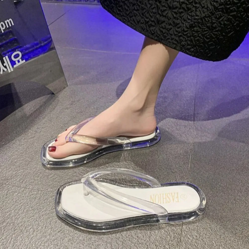 

Элегантные прозрачные шлепанцы, тапочки, противоскользящая обувь на плоской подошве из ПВХ, пляжная одежда, женские шлепанцы на платформе