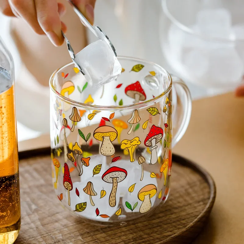 

Enhance your drinking experience with this charming and unique glass mug, showcasing a delightful design of fresh fruits and col