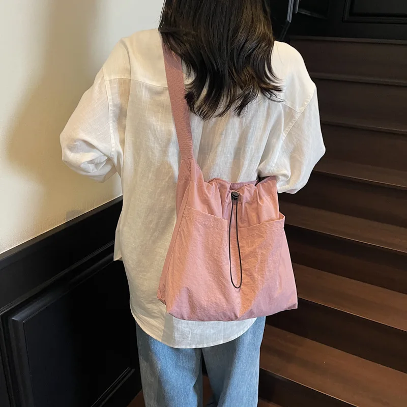 

2025 New Women's Nylon Tote Bag, Chic Crossbody Purse with Adjustable Strap, Lightweight Multi-Pocket Sling for Work & Travel​