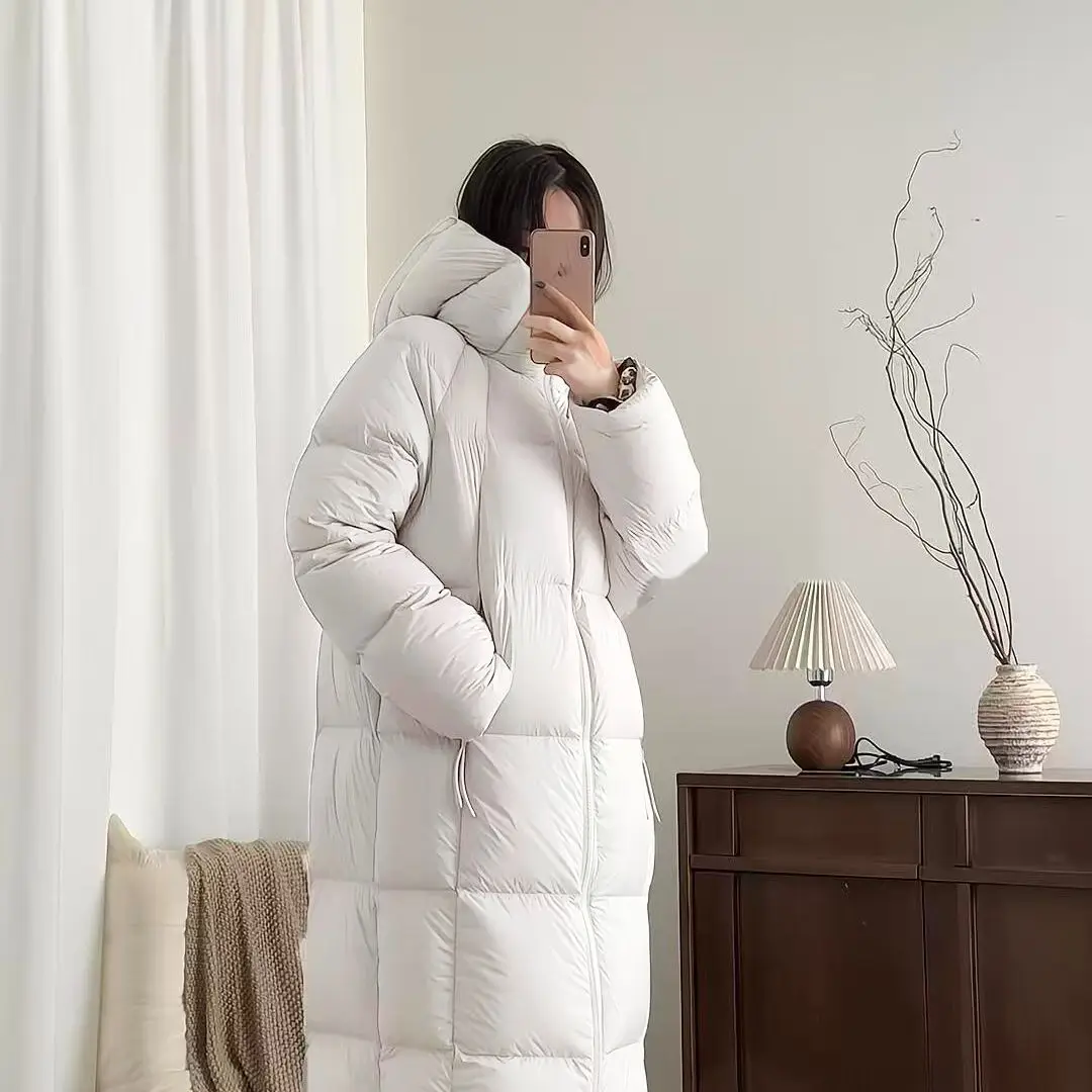 2025 Nuovo cappotto invernale con cappuccio giacca imbottita in cotone con pane addensato lungo sopra il ginocchio da donna