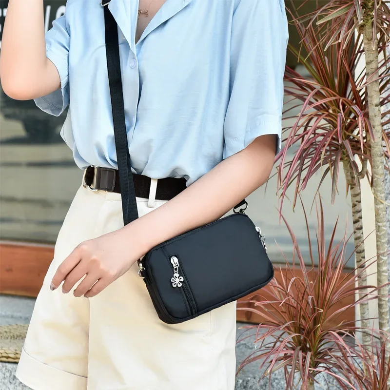 

Mobile Phone Bags Female Hand Holding Mini Small Bag 2023 New All-match Messenger Bag Wrist Mobile Phone Bag Long Coin Purse