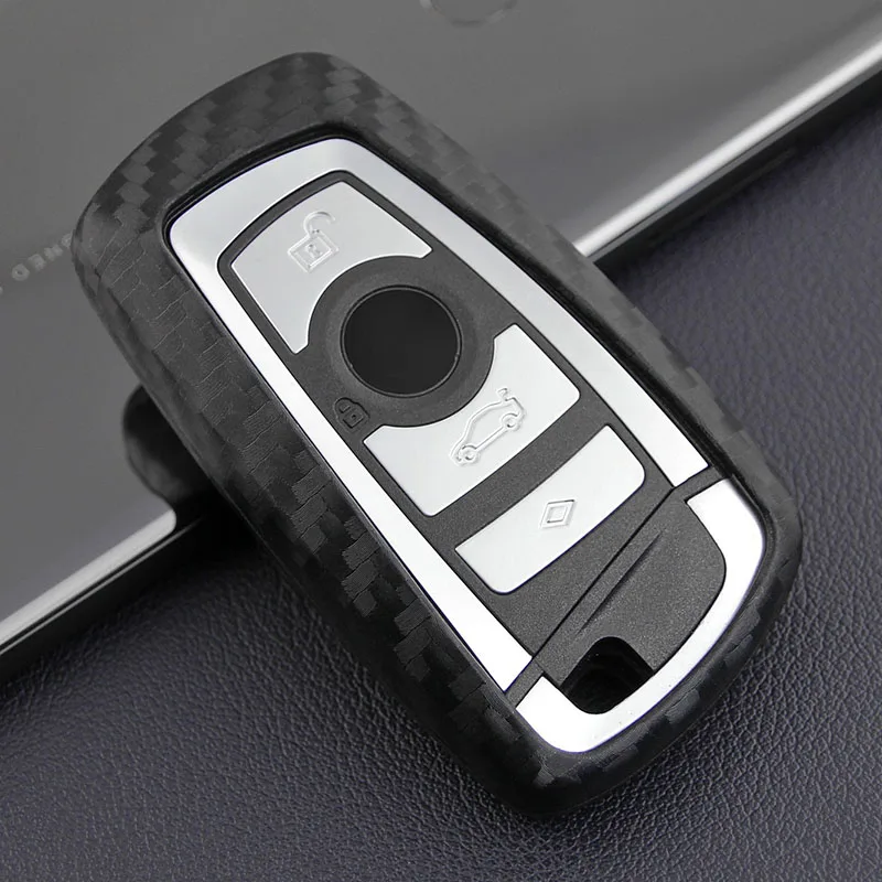 

Car Key Case Carbon Fiber for Bmw E92 X3 E83 E91 M4 F40 X5 E70 X7 X4 G05 G30 Serie 1 X1 U11 F34 Keychain Vehicles Keys Holder