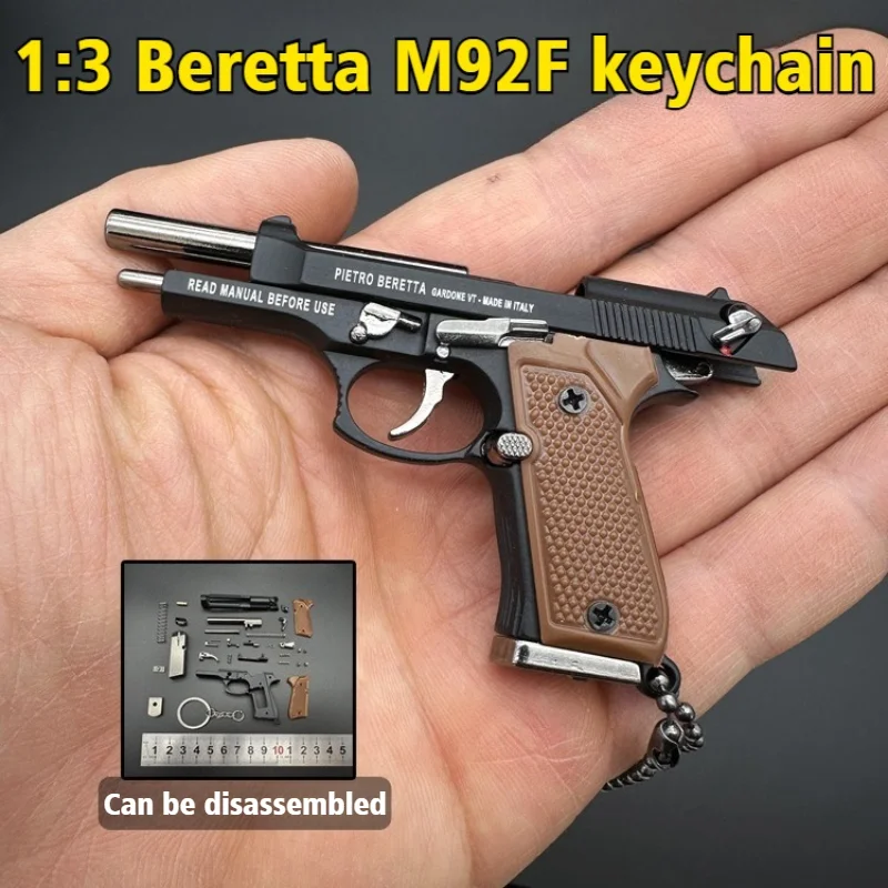 2025 PUBG 1:3 Metal Beretta M92F pistola modelo llavero regalo lanzar la concha colgante decoración manualidades figuritas y miniaturas