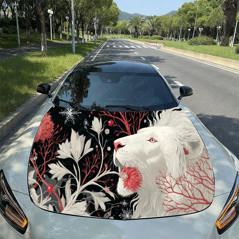 Elegant lion with red eyes and flowing mane, surrounded by intricate floral patterns on a  car hood.Car Hood Sticker