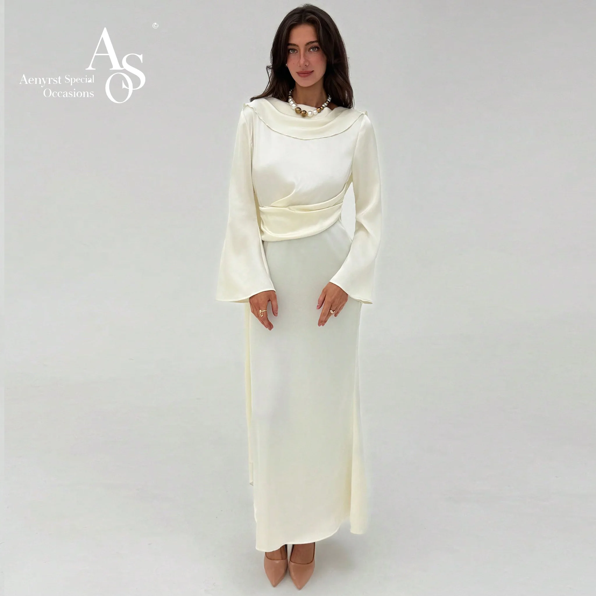 An elegant ivory long-sleeved backless pleated ankle-length dress, suitable for formal occasions and graduation dances.