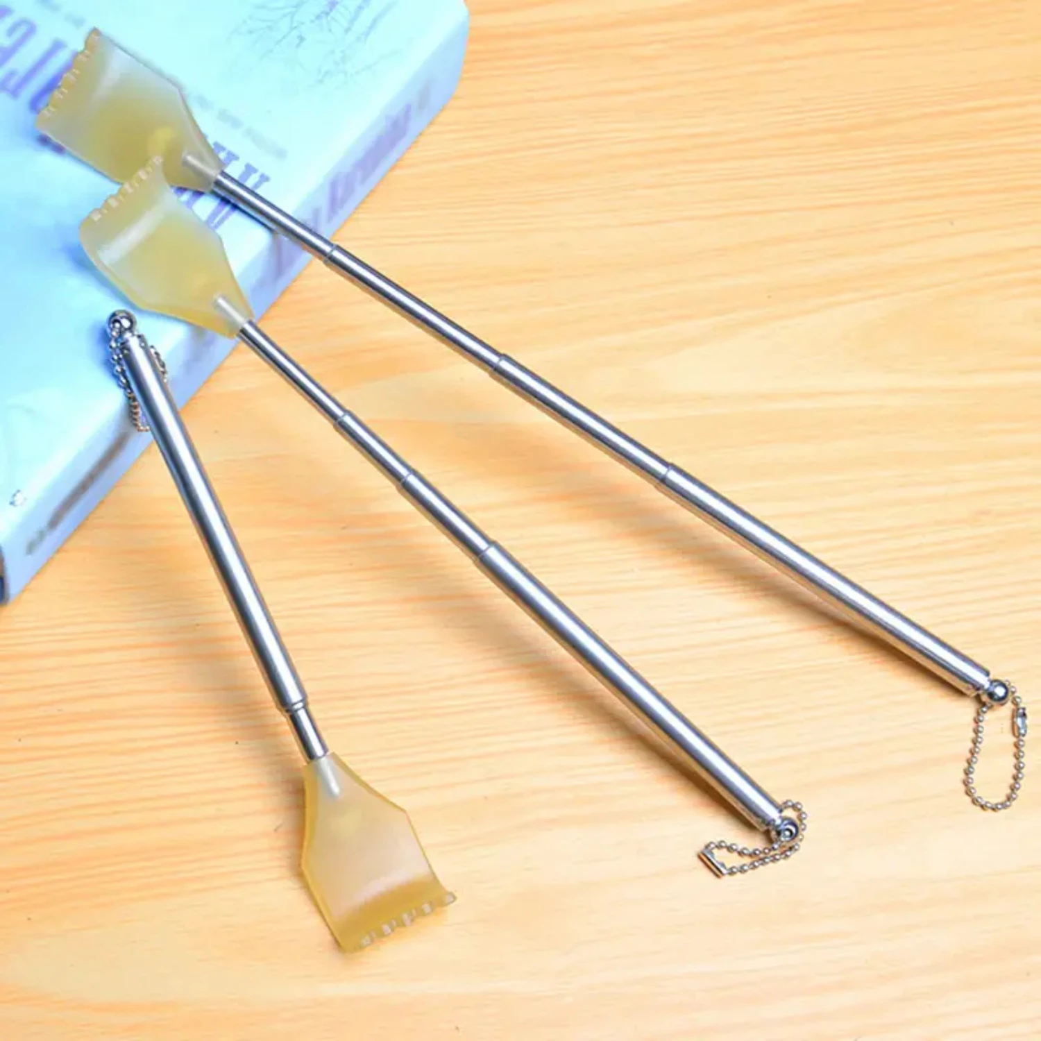 

Convenient and High-Quality Telescopic Back Grabber Tool Set - 2pcs Comfortable Massage Tickle Rake in Stainless Steel for Easy