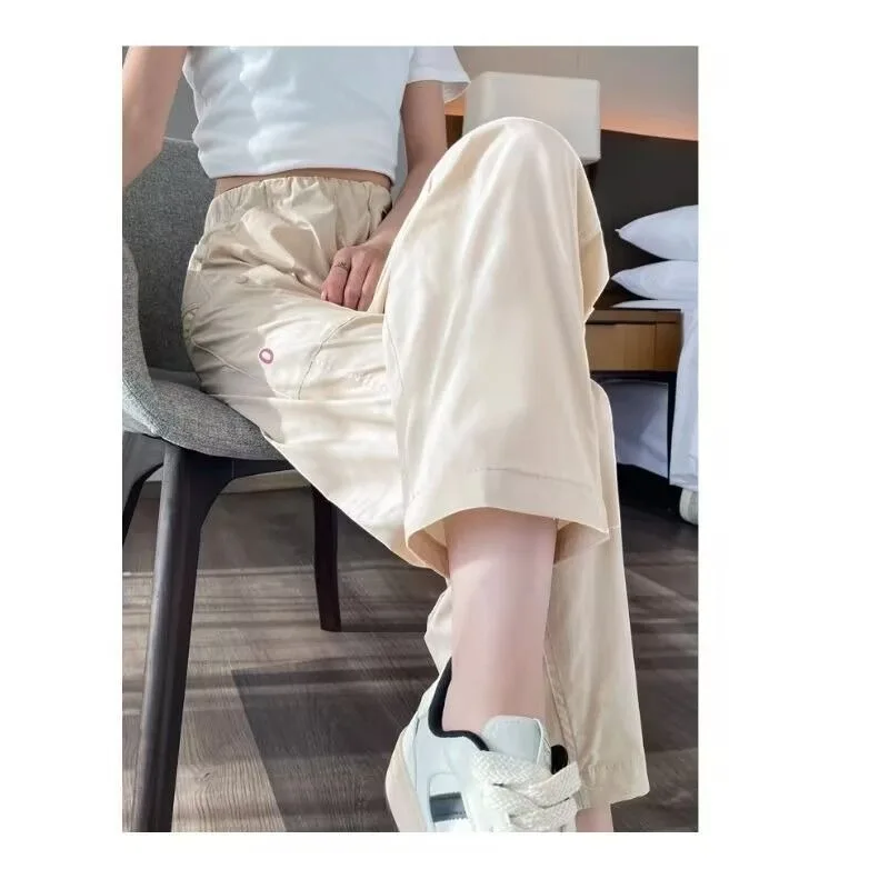 Ropa de mujer Color sólido elástico cintura alta bolsillo Harem Casual suelta moda Leggings pantalones deportivos