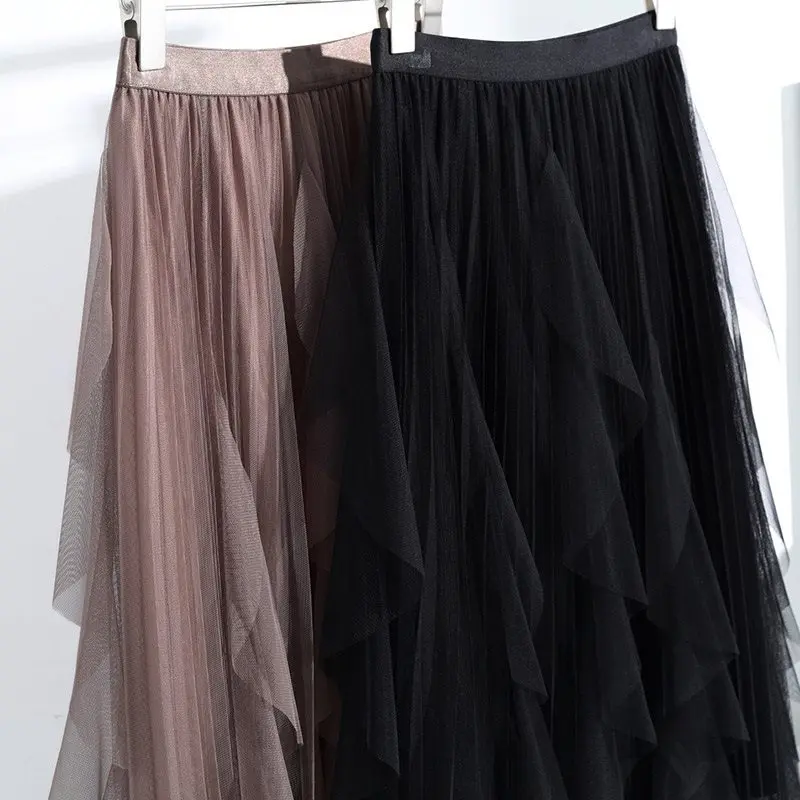 Saia de gaze irregular bege feminina outono e inverno cintura alta uma palavra malha plissada saia de balanço médio e longo