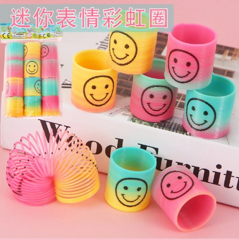 12 pcs/bag 3.2*3.5cm Mini emoji rainbow circle Ring Magic Colorful Spring Big Coil Toy Plastic Rainbow Magic flexible Spring