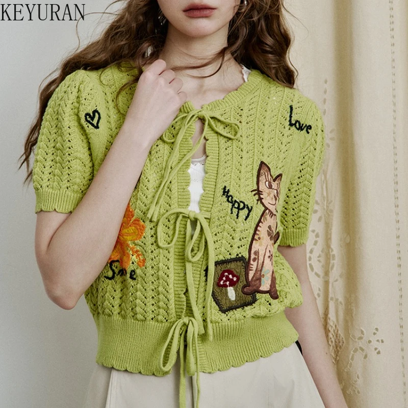 

2025 Spring Summer Cat Embroidery White Hollow Out Short Sleeve Knitted Cardigan Sweater Women Elegant Fashion Knitwear Crop Top
