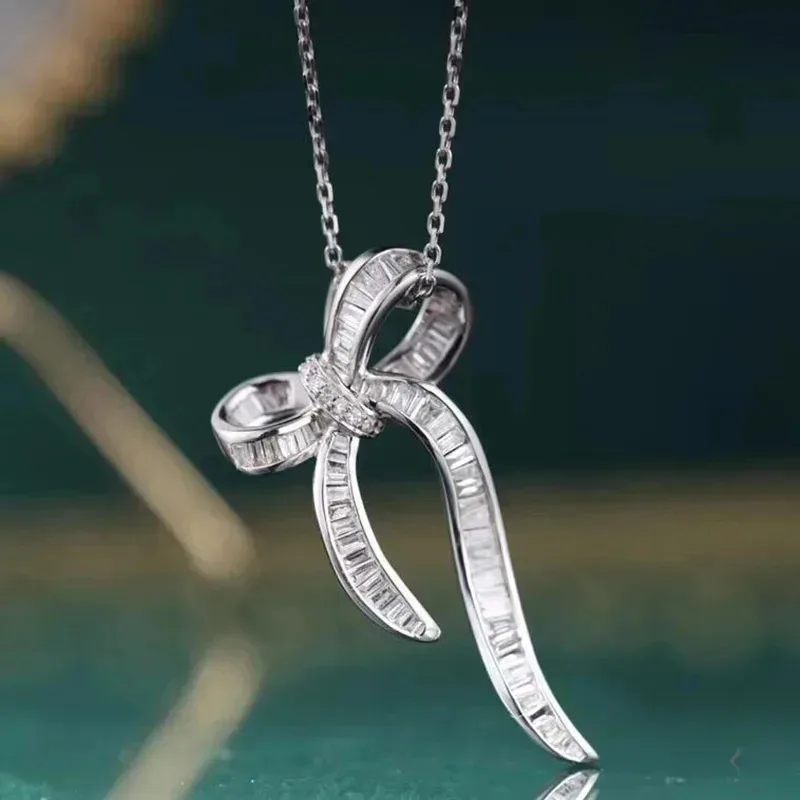 

ROBOTD 2026 New French Luxury Bowknot Fashion Women's Necklace Tilda's Bow S925 Silver High quality Moissanite Party Gifts Hot