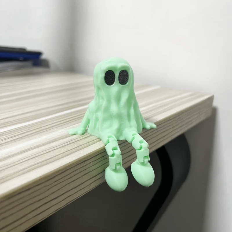 A cute little ghost figurine that is perfect for desktop decoration and always endearing