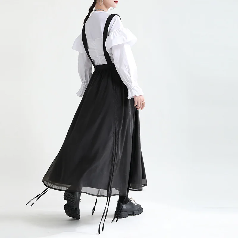 Design sense black suspender skirt 2024 spring clothes high waist slimming mid-length drawstring half skirt female