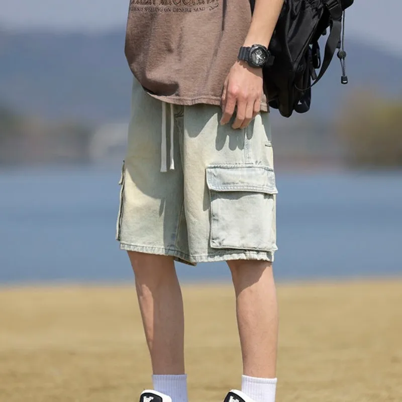 Pantaloni jeans corti da uomo Cargo larghi dritti larghi grigi larghi pantaloncini di jeans da uomo larghi popolari Y2k moda taglio bottoni retrò blu vendita