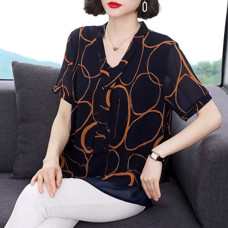 

Fashion V-Neck Lace Up Printed Fake Two Pieces Blouses Women's Clothing 2025 Summer New Loose Commuter Tops All-match Shirts