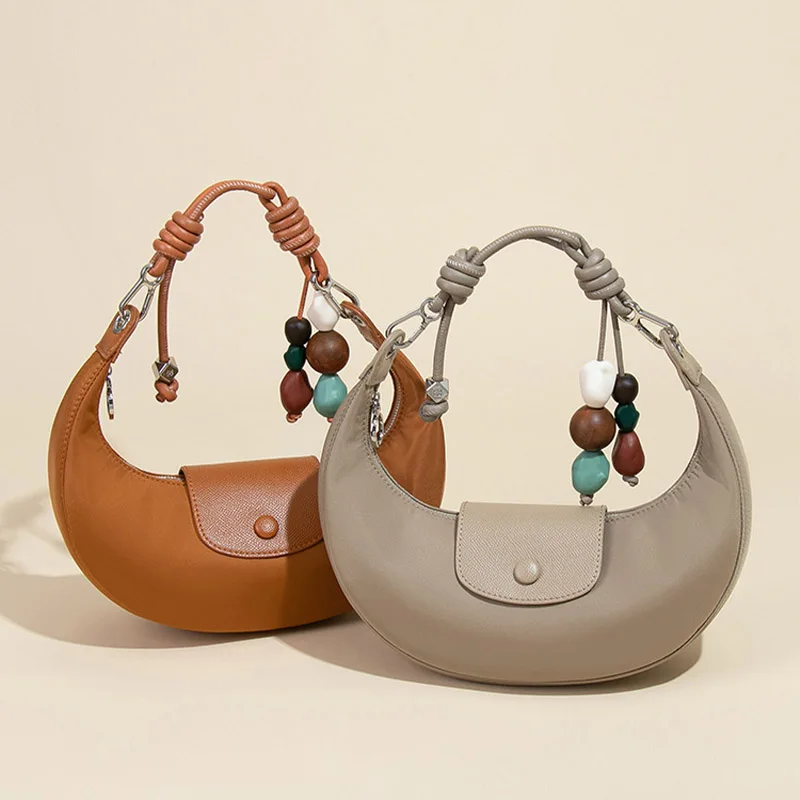 

2025 new fashion French beaded dumpling bag elegant half a month hand armpit bag women's niche design shoulder pea bag handbag