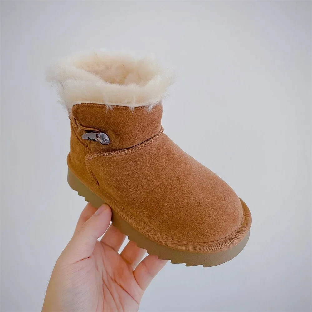 Nieuwe stijl winter nieuwe kinderschoenen jongen lederen dikke snowboots meisje modieuze warme katoenen laarzen