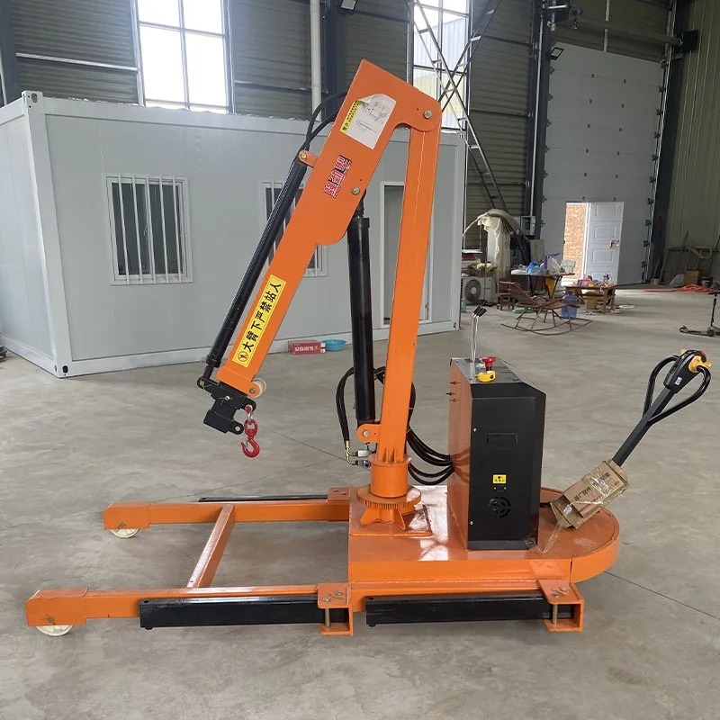 

Небольшой автомобильный мобильный кран с эффективным гидравлическим складным телескопическим кронштейном и тросом.