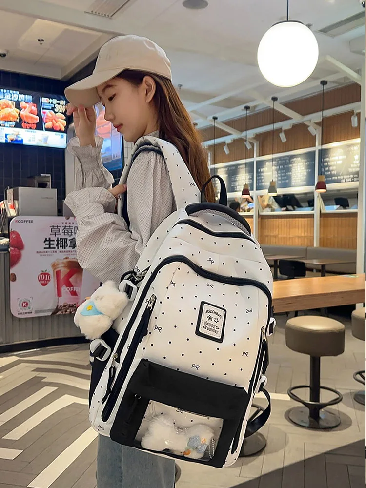 

Lightweight and Versatile Backpack for Outings, Fresh Polka Dot Bow Design, Large Capacity Canvas Backpack, Lightweight Daypack.