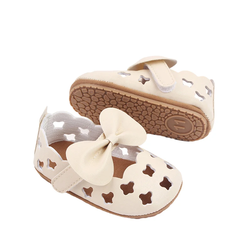 เด็กทารกรองเท้าแตะหนัง PU เด็กวัยหัดเดิน Non-SLIP Hollow OUT Bow First Walking Soft Sole รองเท้า