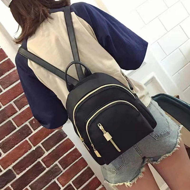 Mochila de nylon impermeável para mulheres Mochila pequena de lazer Bolsa de livro de estudante Bolsa de ombro casual Moda