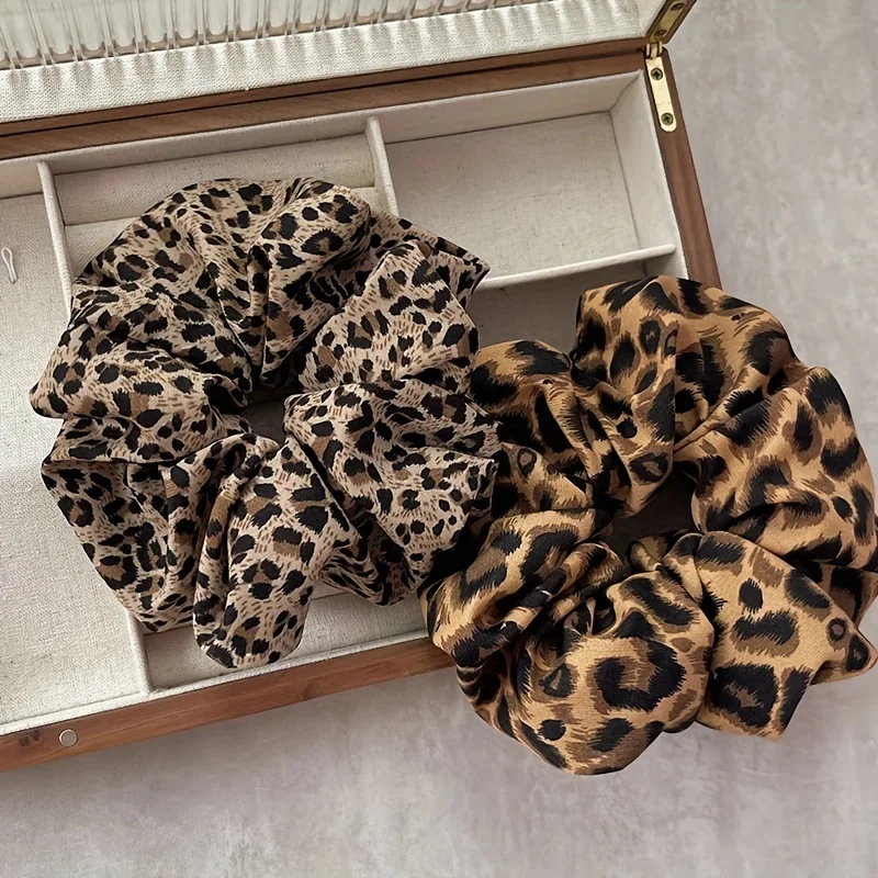 

Элегантный набор резинок для волос с леопардовым принтом, 2 шт., высокая эластичность ткани, пушистый низкий хвост для ухода за волосами с отделкой для девочек