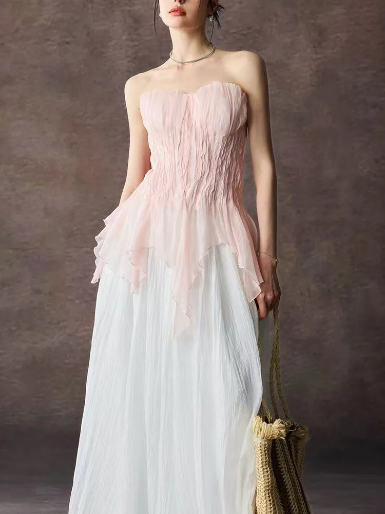 

Pure desire style pleated plunging top with a waistline that accentuates the figure and an irregular bottom hem. 2026 new design