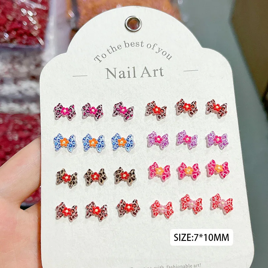 100개 7*10mm 새 레오파드 보우 & 플로럴 네일 참 - 5개 꽃잎 레진 네일 아트, 트렌디하고 시크한 매니큐어를 위한 독특한 프레스온 네일 장식