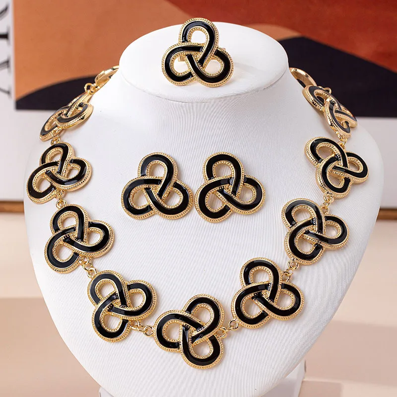 

4PCS Vintage Elegant Irregular Geometric Circle Necklace Earring Post for Women Black Enamel Hollow Flower Ring Jewelry Set