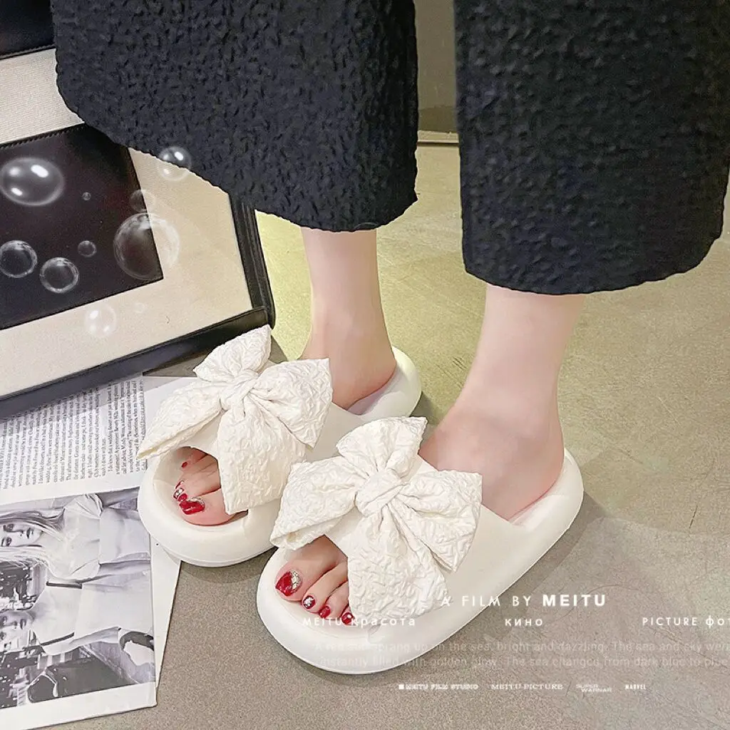 New EVA thick-bottomed bow cool slippers women's summer wear fashion Internet celebrity indoor home sweet one-word drag