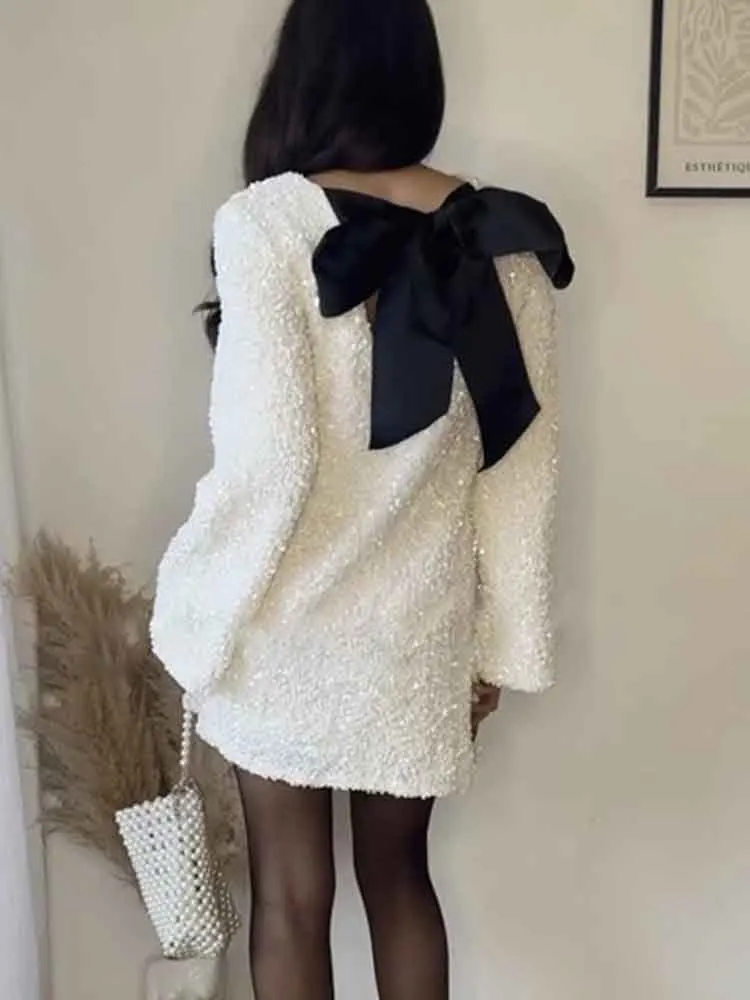 

Fashion New Sexy Sequins Backless Mini Dress Women Autumn Winter O-neck Long Sleeve Dresses 2024 Casual Loose White Bow Robe