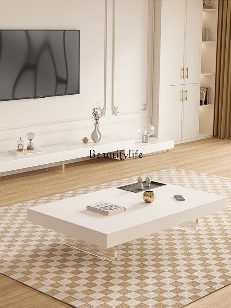 

Cream style modern simple acrylic suspended rock slab coffee table small apartment French minimalist